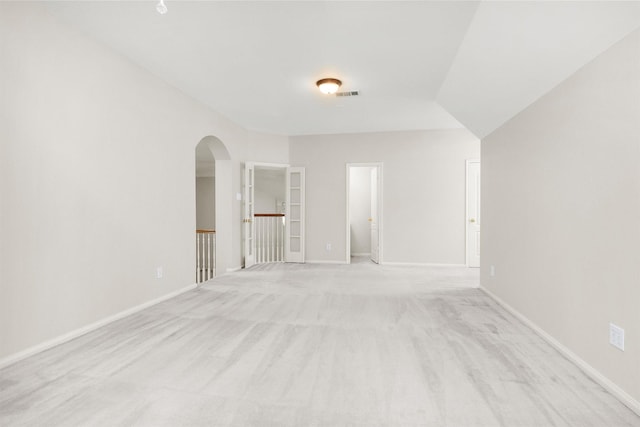 14015 Halprin Creek Dr, Cypress, TX 77429 - empty room featuring arched walkways and light carpet
