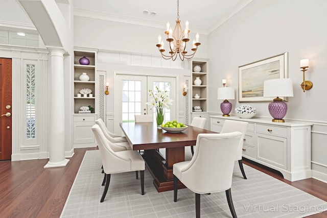 14015 Halprin Creek Dr, Cypress, TX 77429 - dining room featuring decorative columns, wood finished floors, crown molding, a chandelier, and built in shelves