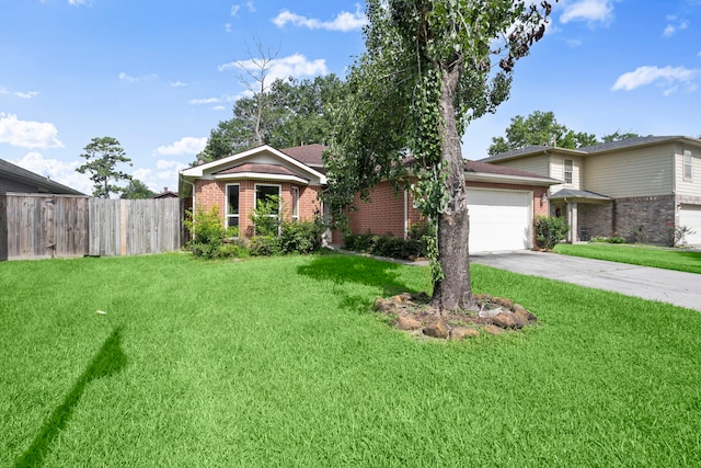 15819 Nutcracker Ct, Humble, TX 77396 - view of front of house featuring brick siding, a garage, and driveway
