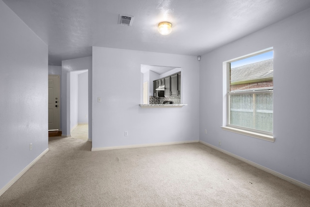 15819 Nutcracker Ct, Humble, TX 77396 - spare room featuring carpet flooring and baseboards