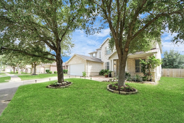 7619 Park Sage Ln, Cypress, TX 77433 - view of front of home featuring driveway, a garage, a standing seam roof, and brick siding