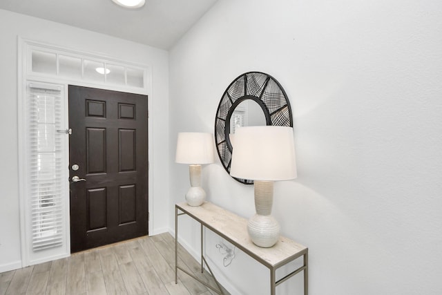 7619 Park Sage Ln, Cypress, TX 77433 - entryway featuring baseboards and light wood-type flooring