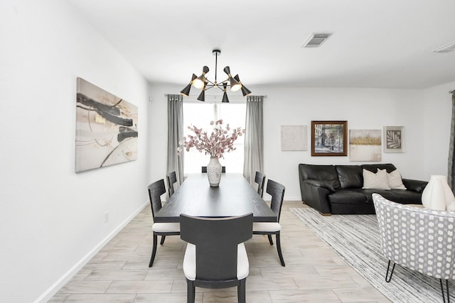 7619 Park Sage Ln, Cypress, TX 77433 - dining area featuring a chandelier and wood tiled floors