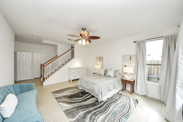 7619 Park Sage Ln, Cypress, TX 77433 - bedroom with tile patterned flooring and a ceiling fan
