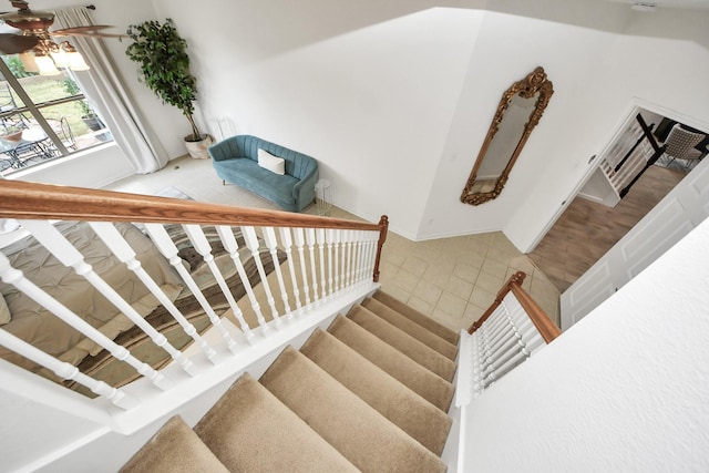 7619 Park Sage Ln, Cypress, TX 77433 - staircase featuring a ceiling fan and tile patterned flooring