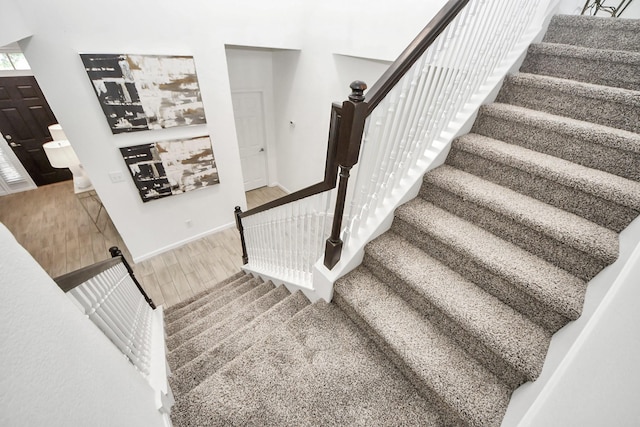 7619 Park Sage Ln, Cypress, TX 77433 - staircase with wood finished floors and baseboards