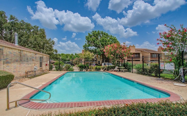 10555 Turtlewood Ct Unit 2802, Houston, TX 77072 - community pool with a patio