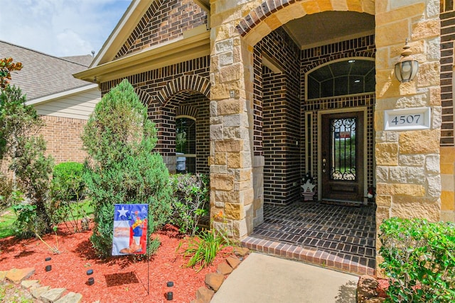 4507 Cinco Forest Trl, Katy, TX 77494 - view of exterior entry featuring brick siding and stone siding