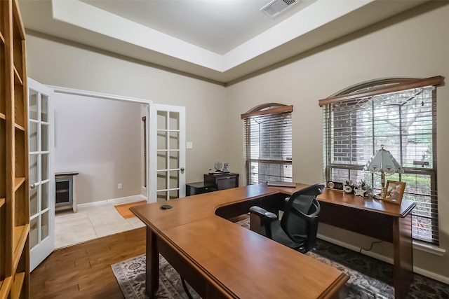 4507 Cinco Forest Trl, Katy, TX 77494 - office space featuring french doors, wood finished floors, and a raised ceiling
