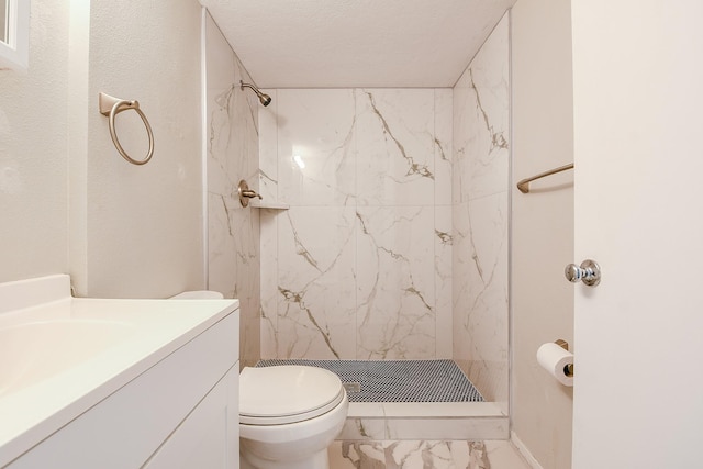 325 Carolcrest Ln Unit 3, Livingston, TX 77351 - full bath featuring marble look tiles, vanity, and a marble finish shower