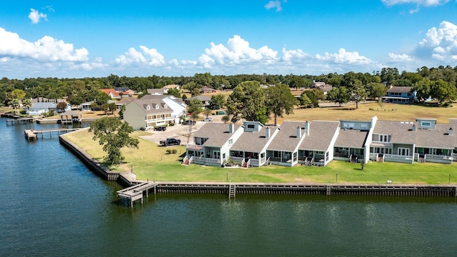 325 Carolcrest Ln Unit 3, Livingston, TX 77351 - aerial view of residential area featuring a nearby body of water and a tree filled landscape