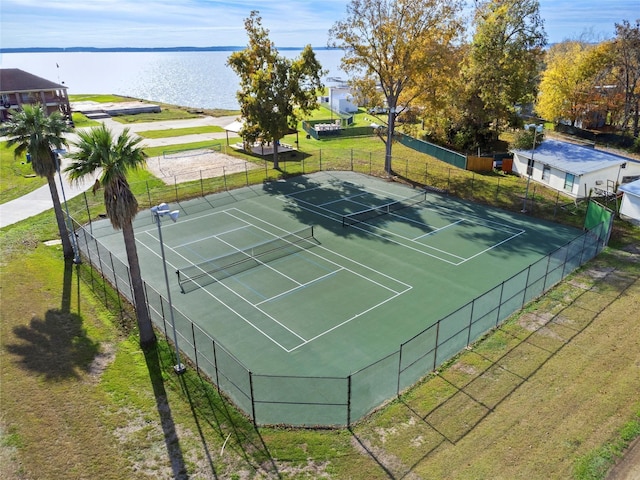 325 Carolcrest Ln Unit 3, Livingston, TX 77351 - view of tennis court with a water view