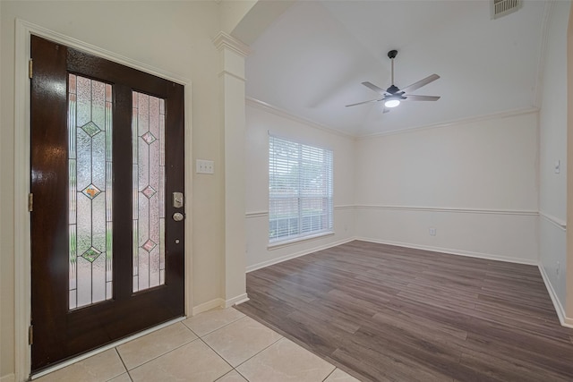 5515 Brookhollow Pines Ct, Houston, TX 77084 - entrance foyer featuring ornate columns, ornamental molding, ceiling fan, wood finished floors, and vaulted ceiling