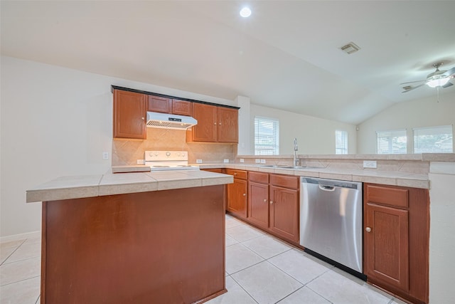 5515 Brookhollow Pines Ct, Houston, TX 77084 - kitchen featuring stainless steel dishwasher, under cabinet range hood, white electric range, light tile patterned floors, and lofted ceiling