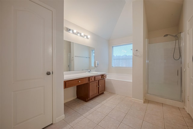 5515 Brookhollow Pines Ct, Houston, TX 77084 - full bath featuring vanity, a garden tub, a shower stall, tile patterned floors, and lofted ceiling