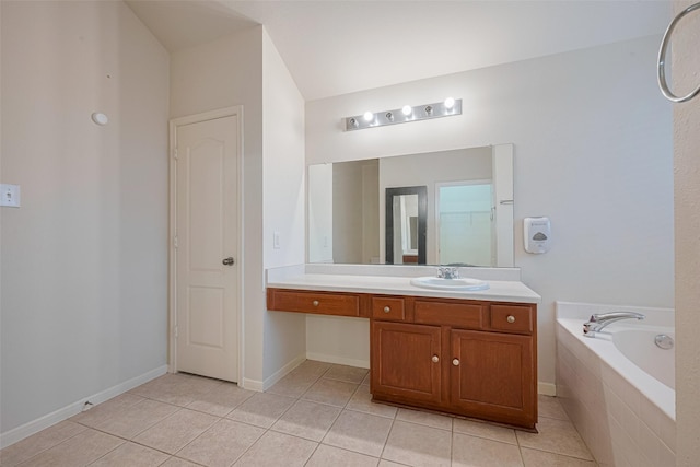 5515 Brookhollow Pines Ct, Houston, TX 77084 - bathroom featuring tile patterned flooring, vanity, and a garden tub