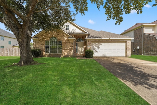 5723 Painted Trail Dr, Houston, TX 77084 - view of front of home featuring concrete driveway, an attached garage, and brick siding