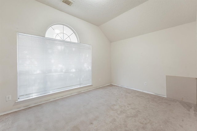 5723 Painted Trail Dr, Houston, TX 77084 - empty room with lofted ceiling and carpet floors