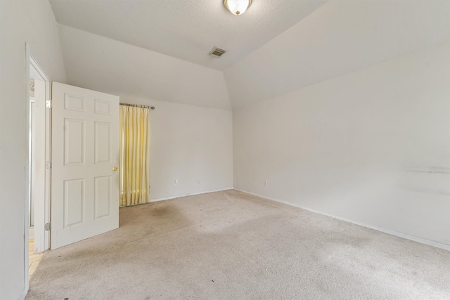 5723 Painted Trail Dr, Houston, TX 77084 - carpeted spare room with lofted ceiling and baseboards