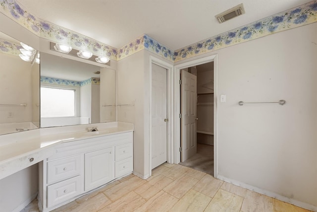 5723 Painted Trail Dr, Houston, TX 77084 - bathroom featuring a closet and vanity