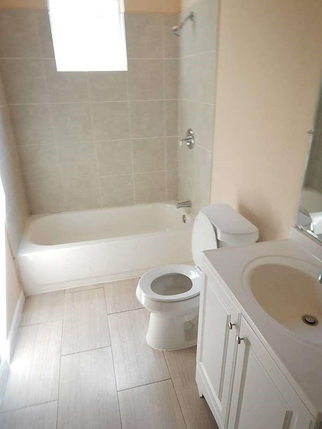 7121 Conley St, Houston, TX 77021 - bathroom with vanity, bathtub / shower combination, and wood finished floors