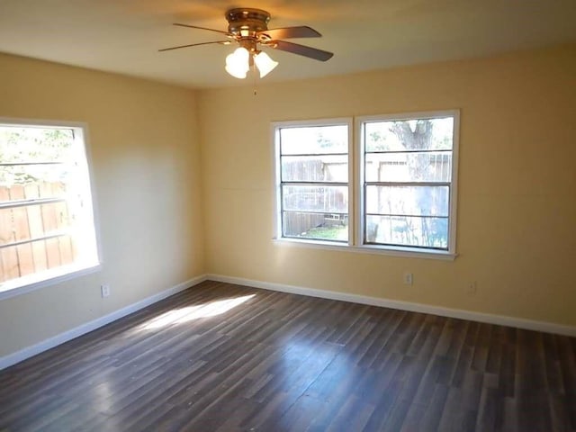 7121 Conley St, Houston, TX 77021 - unfurnished room featuring ceiling fan and dark wood-type flooring