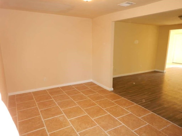 7121 Conley St, Houston, TX 77021 - empty room with baseboards and wood finished floors