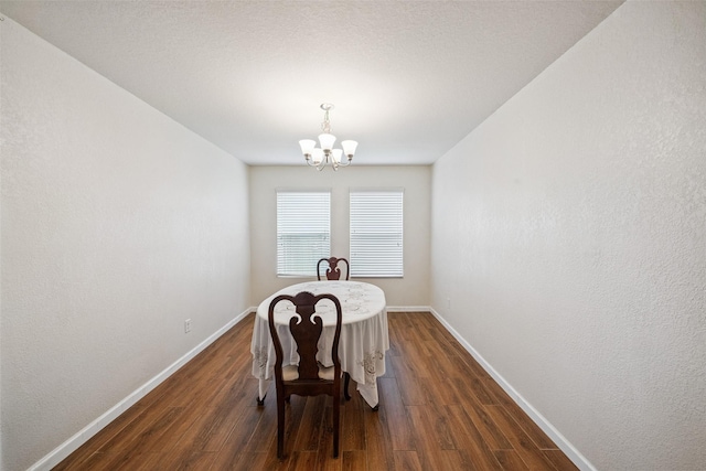 16743 Fallen Timbers Dr, Conroe, TX 77385 - dining room with a chandelier and dark wood finished floors