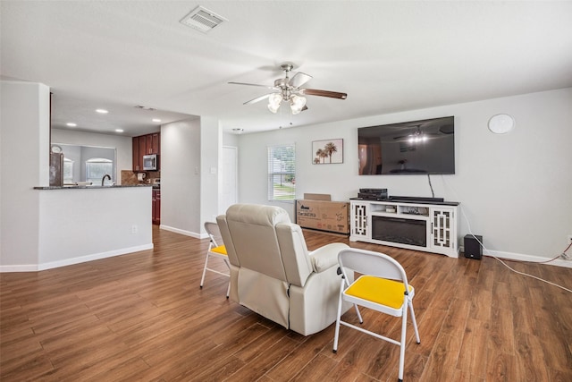 16743 Fallen Timbers Dr, Conroe, TX 77385 - living room with a ceiling fan, dark wood finished floors, and recessed lighting