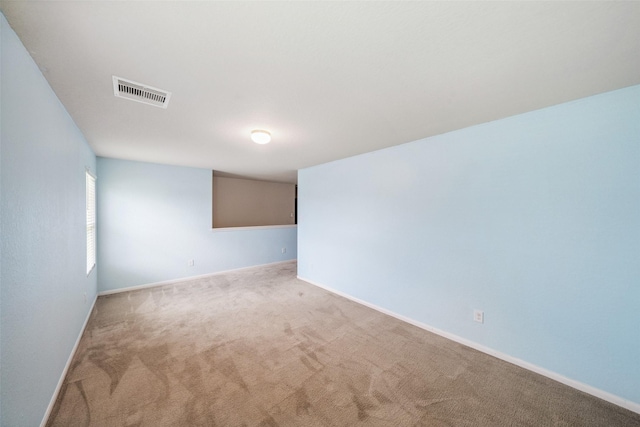 16743 Fallen Timbers Dr, Conroe, TX 77385 - carpeted spare room with baseboards