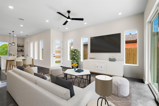 8205 Parnell St, Houston, TX 77051 - living area with recessed lighting and ceiling fan