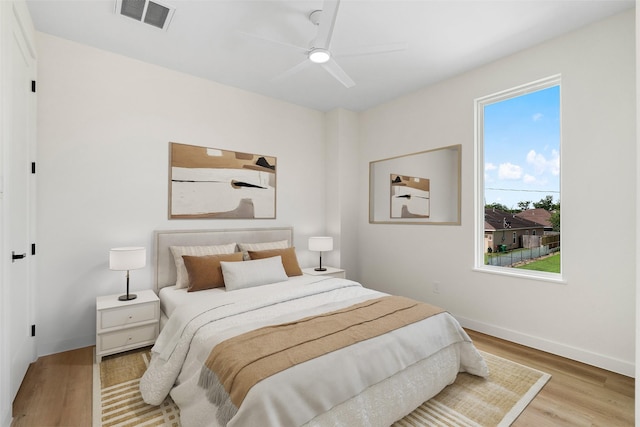 8205 Parnell St, Houston, TX 77051 - bedroom featuring wood finished floors and ceiling fan