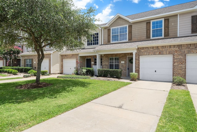 8342 Cassidy Creek Ct, Houston, TX 77095 - view of front of property with an attached garage, a front lawn, driveway, a shingled roof, and brick siding