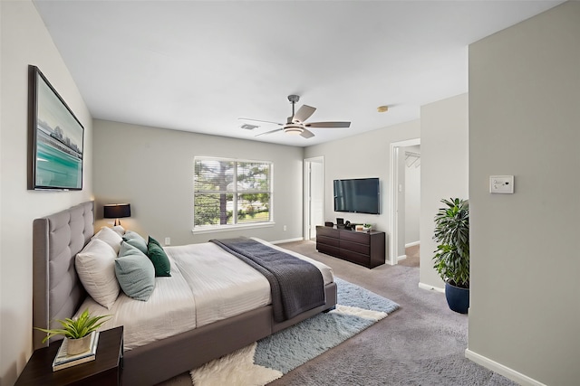 8342 Cassidy Creek Ct, Houston, TX 77095 - carpeted bedroom featuring baseboards and a ceiling fan