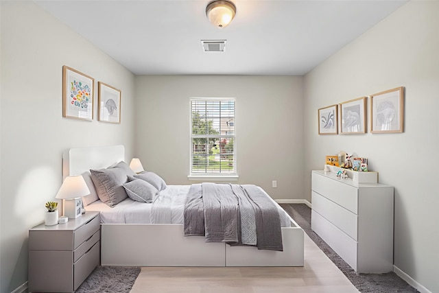 8342 Cassidy Creek Ct, Houston, TX 77095 - bedroom with baseboards and wood finished floors