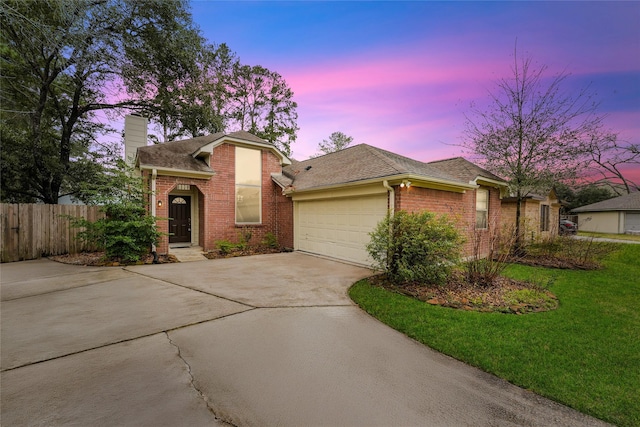12319 Hamsfield Ct, Tomball, TX 77377 - ranch-style house with brick siding, concrete driveway, a chimney, and a garage