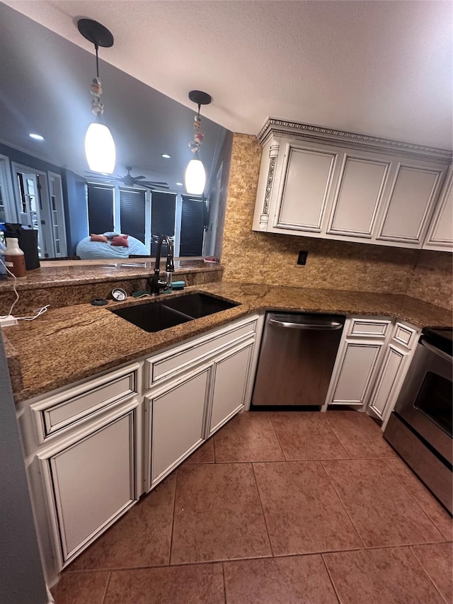 15002 Windward Dr Unit 207, Corpus Christi, TX 78418 - kitchen featuring dishwasher, range, dark tile patterned floors, decorative light fixtures, and tasteful backsplash