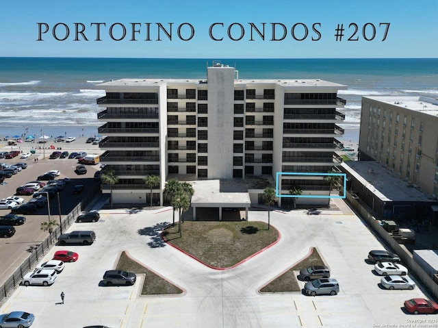15002 Windward Dr Unit 207, Corpus Christi, TX 78418 - view of building exterior with view of water and beach