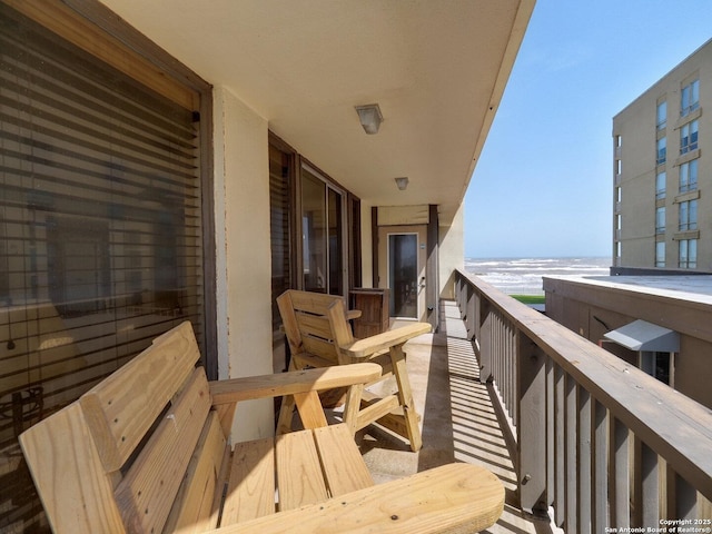 15002 Windward Dr Unit 207, Corpus Christi, TX 78418 - balcony featuring view of water and beach