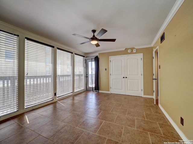 15002 Windward Dr Unit 207, Corpus Christi, TX 78418 - unfurnished bedroom featuring access to exterior, crown molding, a ceiling fan, and a closet