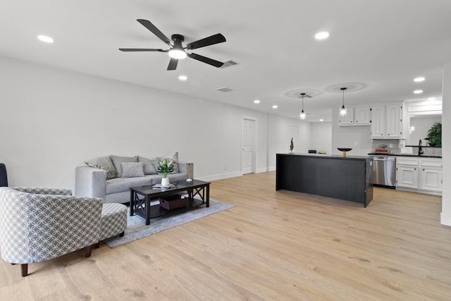 806 Lyngrove Dr, Houston, TX 77038 - living area featuring recessed lighting, light wood-style flooring, and a ceiling fan