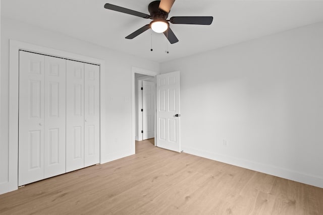 806 Lyngrove Dr, Houston, TX 77038 - unfurnished bedroom featuring light wood-type flooring, a closet, and ceiling fan