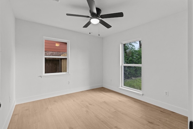 806 Lyngrove Dr, Houston, TX 77038 - spare room with light wood finished floors and ceiling fan