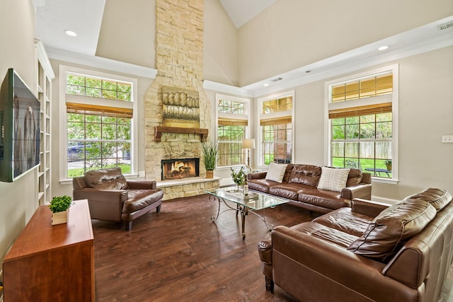 33318 Winsford St, Fulshear, TX 77441 - living area featuring hardwood / wood-style floors, a fireplace, high vaulted ceiling, and recessed lighting