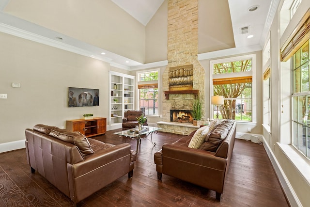33318 Winsford St, Fulshear, TX 77441 - living room featuring a fireplace, dark wood-type flooring, and high vaulted ceiling