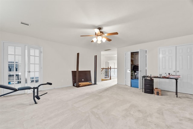 3922 Crestwind Ln, Richmond, TX 77407 - workout area with carpet flooring, a ceiling fan, and french doors