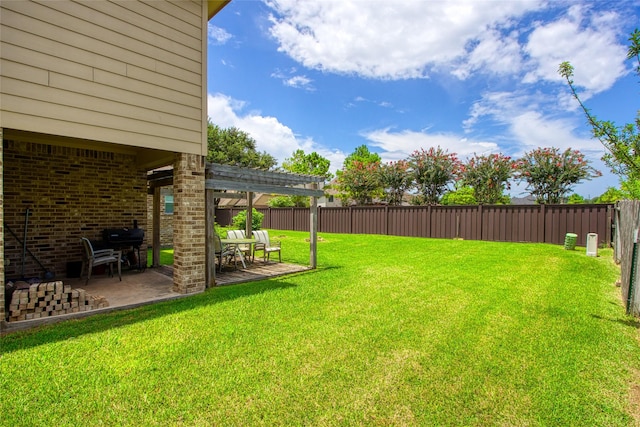3922 Crestwind Ln, Richmond, TX 77407 - fenced backyard with a patio area and a pergola