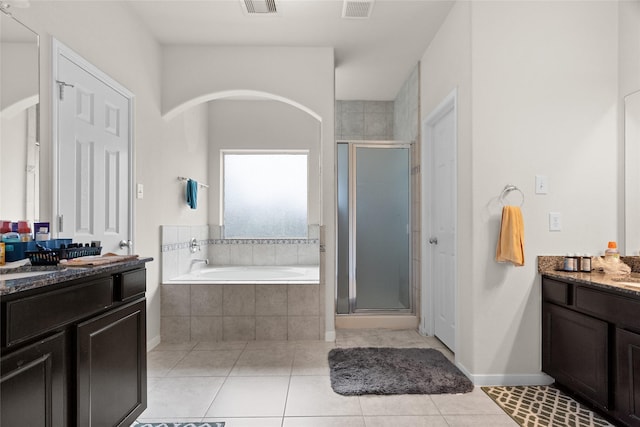 3922 Crestwind Ln, Richmond, TX 77407 - full bath featuring vanity, a stall shower, a bath, and tile patterned flooring