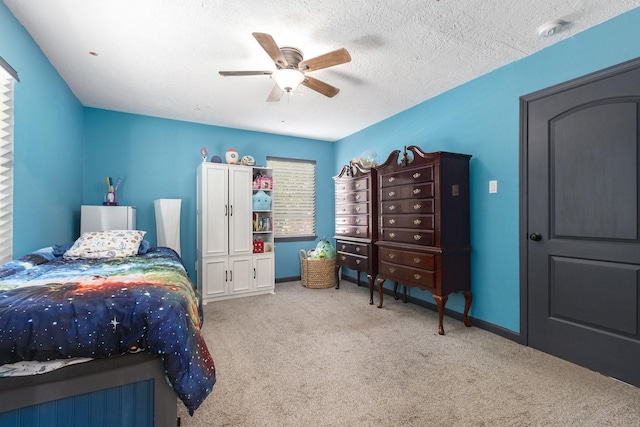 418 E Cedar Bayou Lynchburg Rd, Baytown, TX 77521 - carpeted bedroom with a ceiling fan and baseboards