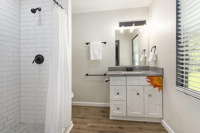 418 E Cedar Bayou Lynchburg Rd, Baytown, TX 77521 - bathroom featuring vanity, wood finished floors, and a stall shower